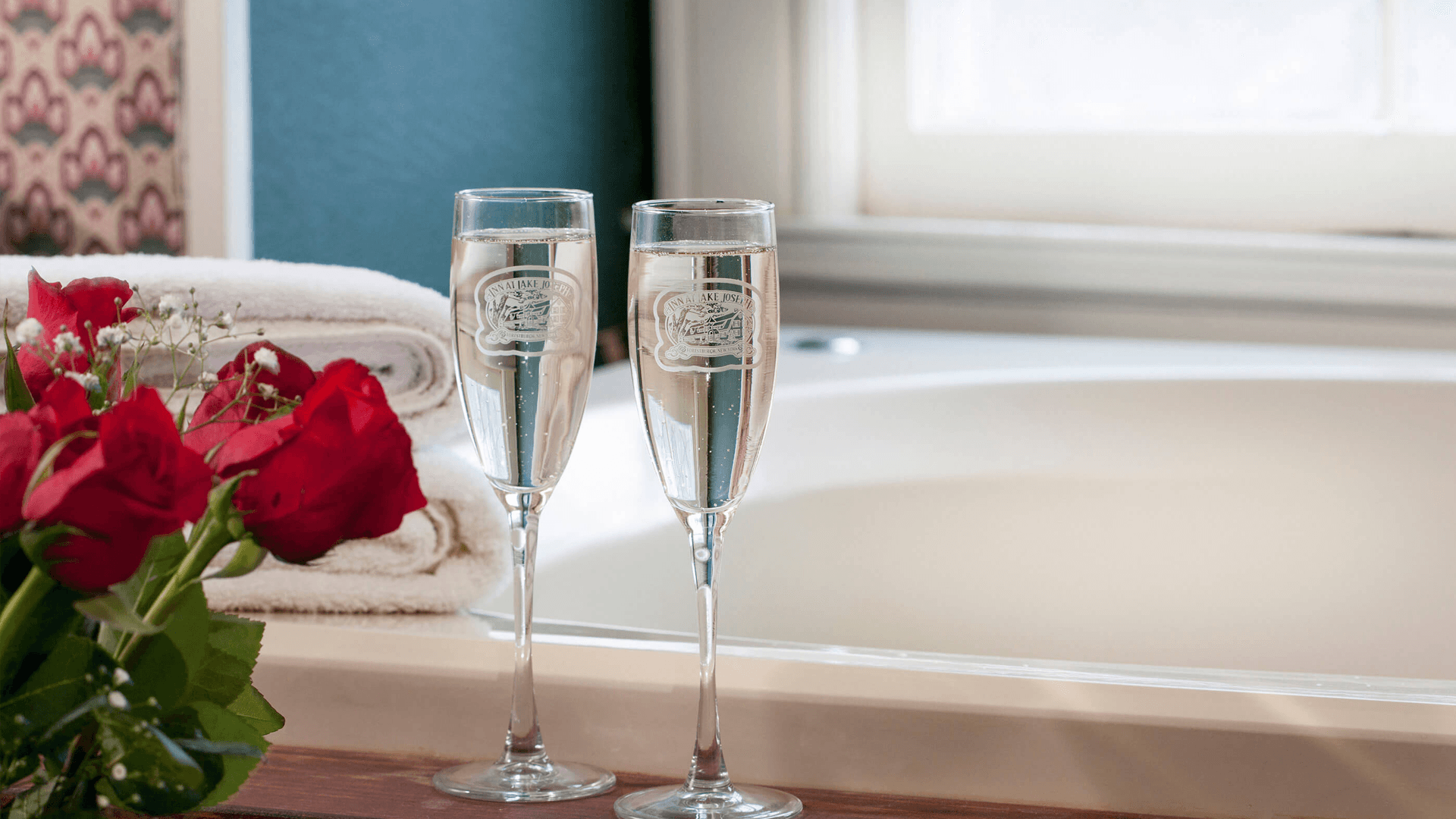 champagne flutes near bathtub