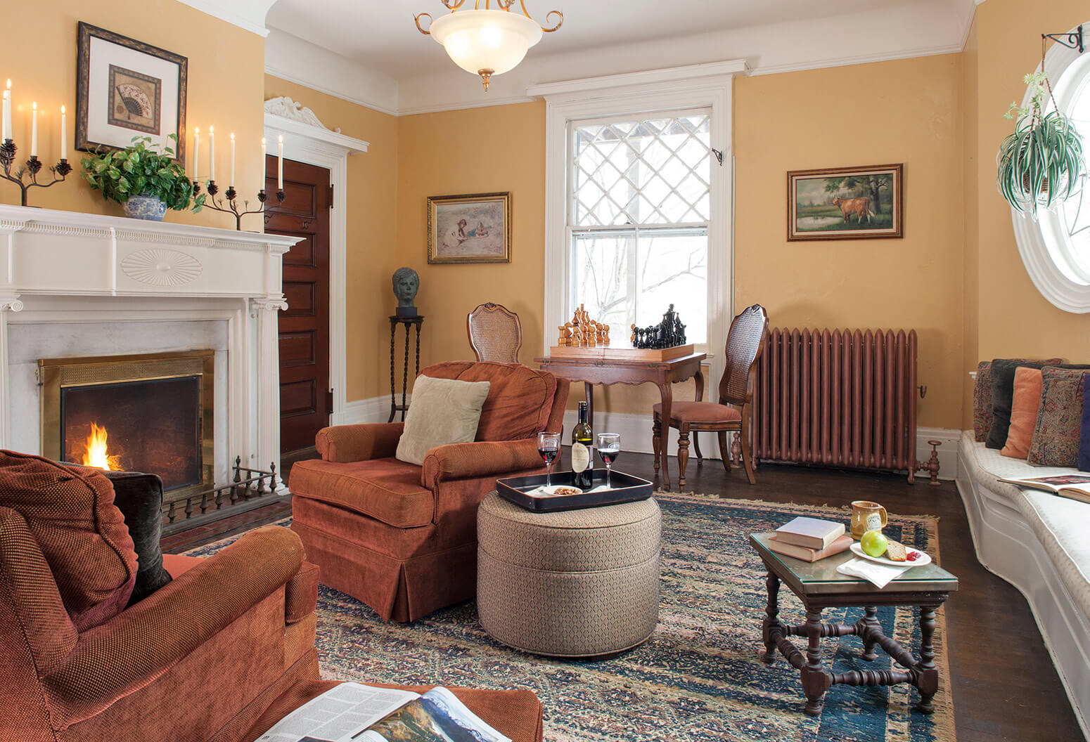 Common area with seating and fireplace