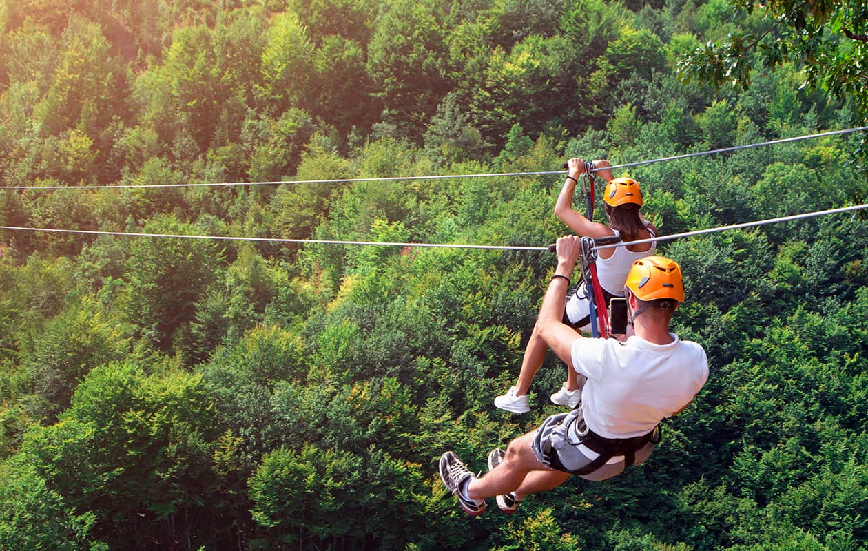 Couple on a zip line